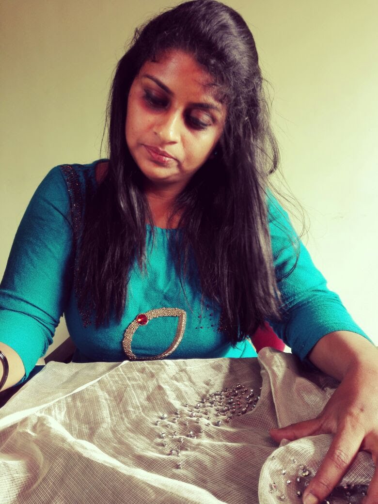 Smitha Haridas doing hand embroidery