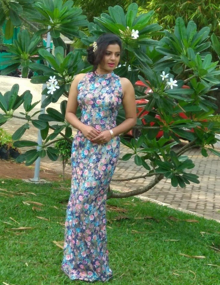 Model in floral gown by S.fab Designs